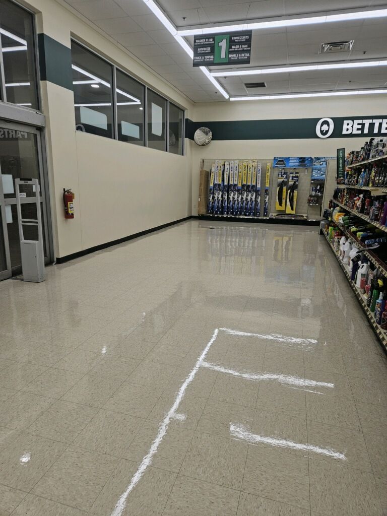 An empty store with a sign that says ' bette ' on it