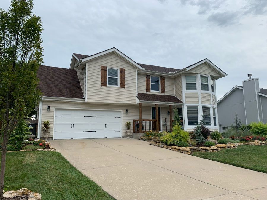 Modern House with New Siding — Lee's Summit, MO — Home Property Solutions