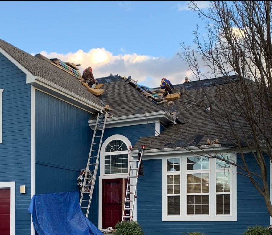 Modern House with New Roof — Lee's Summit, MO — Home Property Solutions