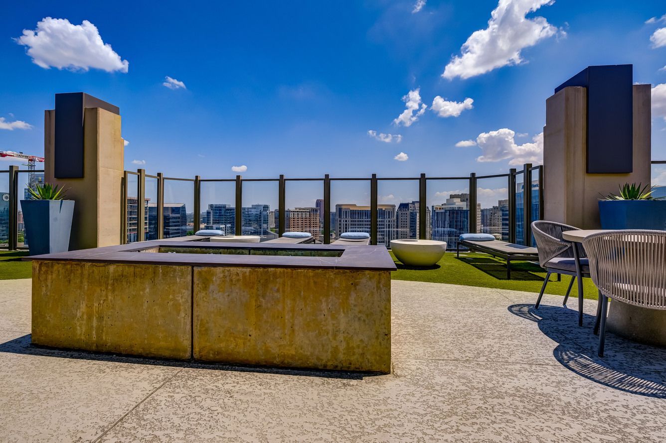 There is a fire pit on the roof of a building.