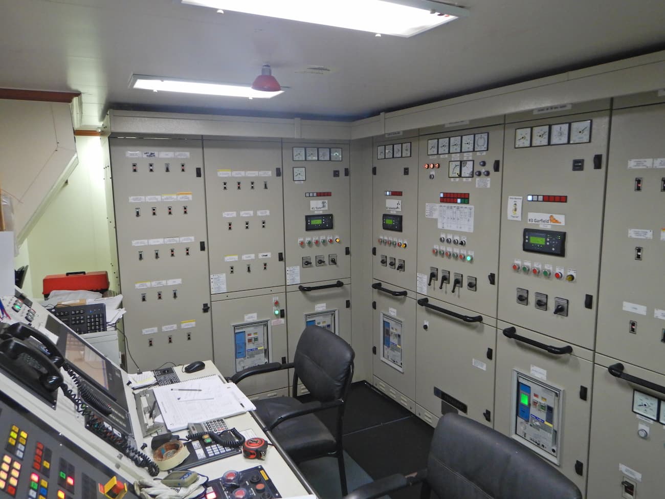 A Room Filled With Lots Of Electrical Panels And A Desk — PASMA Electrical In Portsmith, QLD