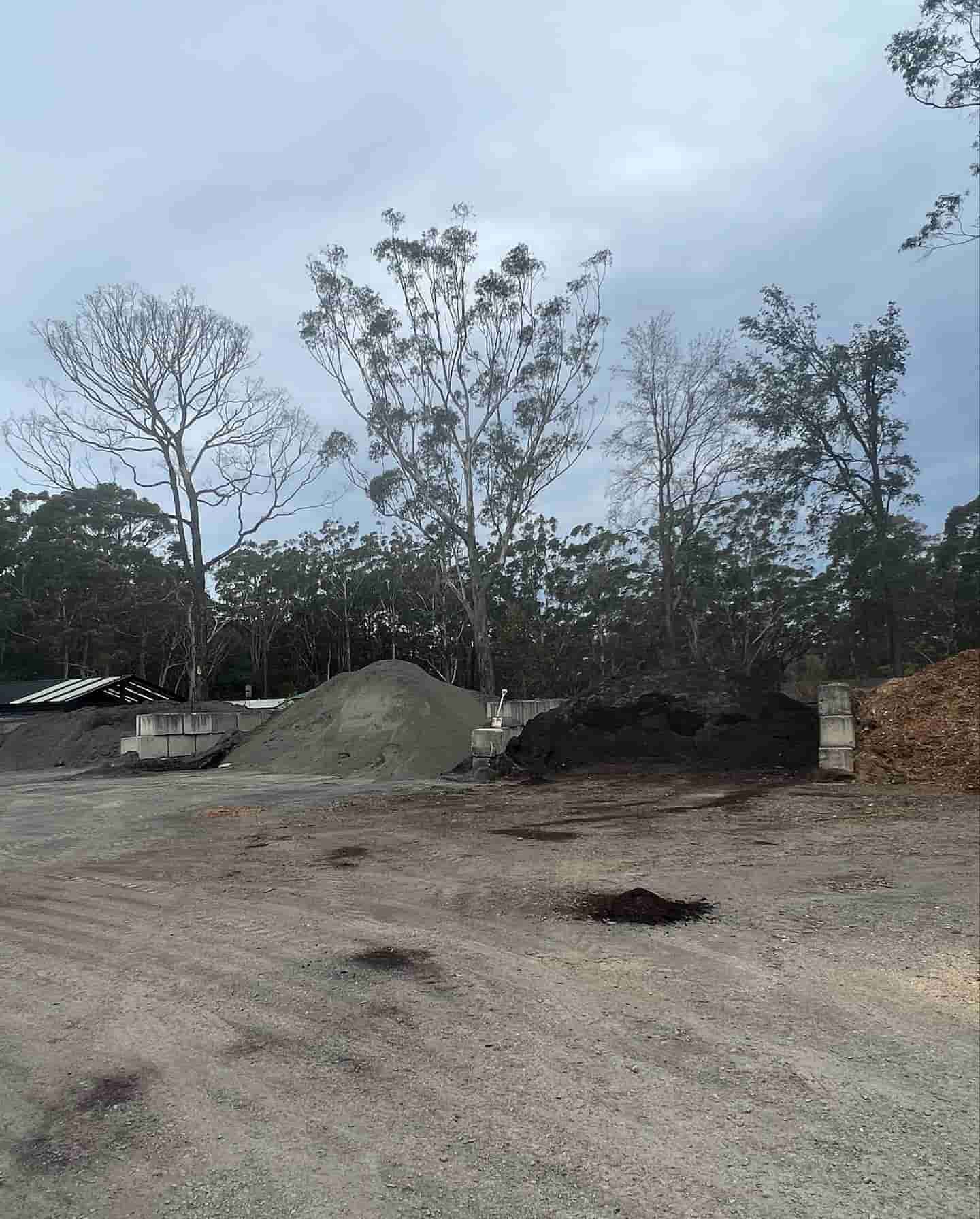 A Pile Of Dirt Is Sitting In The Middle Of A Dirt Field — JMAK Haulage & Landscapes Supplies In Ulladulla, NSW