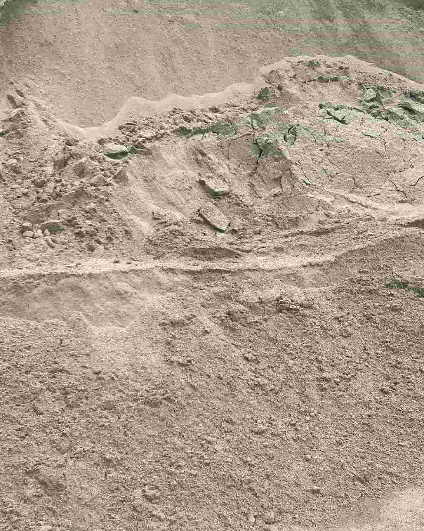 A Pile Of Sand Is Sitting On Top Of A Pile Of Dirt — JMAK Haulage & Landscapes Supplies In Falls Creek, NSW