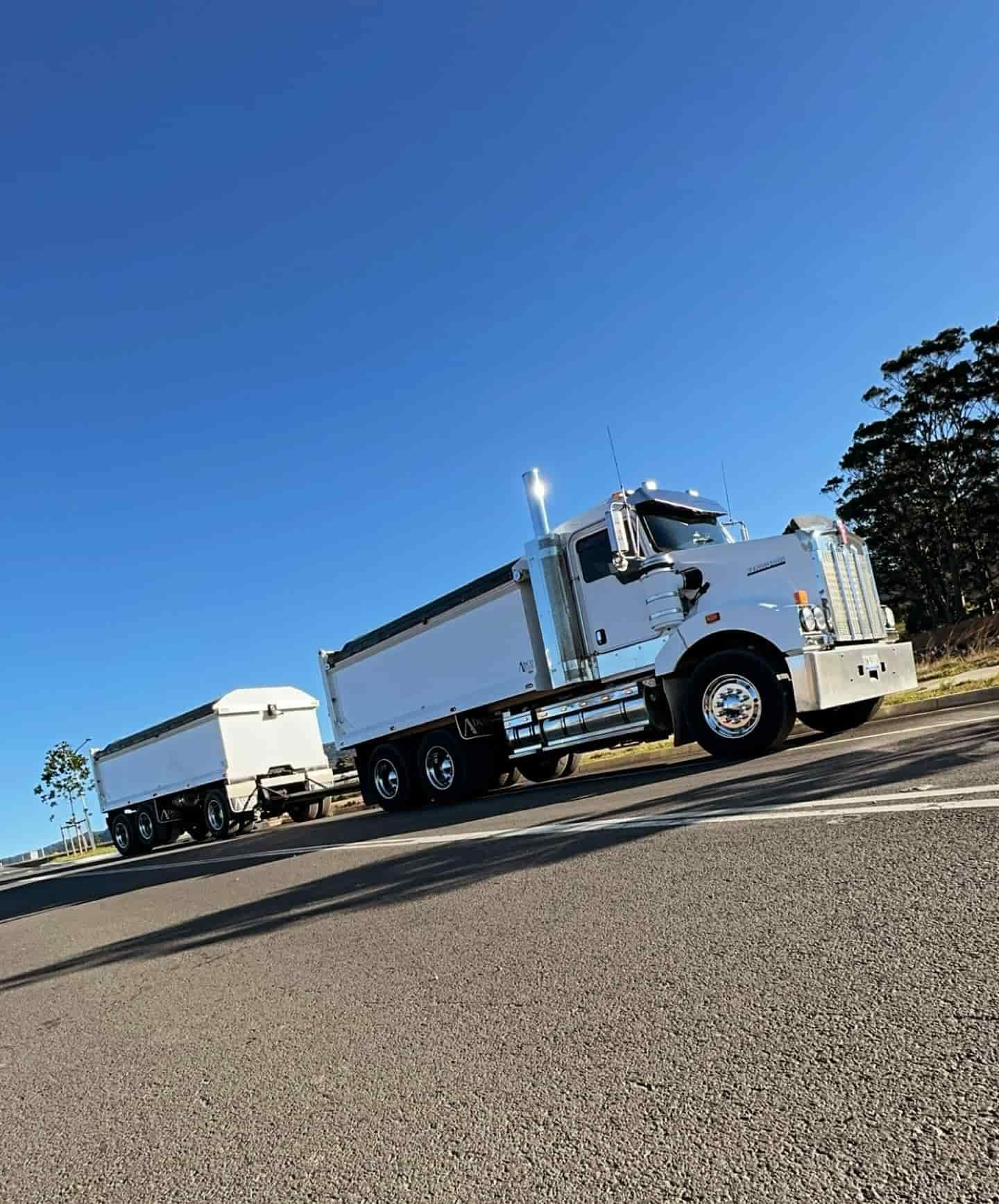 A White Semi Truck Is Parked On The Side Of The Road — JMAK Haulage & Landscapes Supplies In Falls Creek, NSW