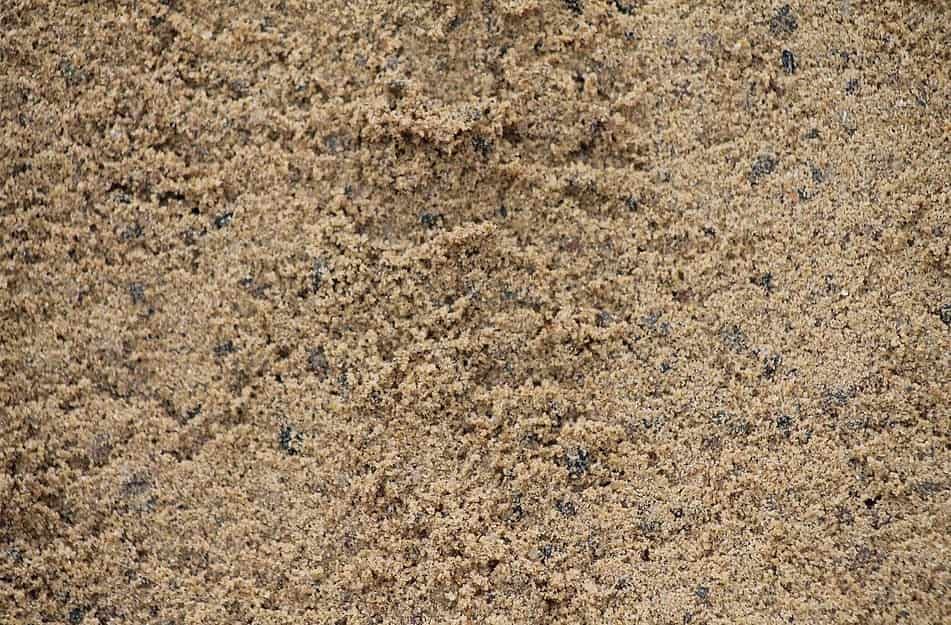 A Pile Of Sand With A Lot Of Small Stones In It — JMAK Haulage & Landscapes Supplies In Falls Creek, NSW