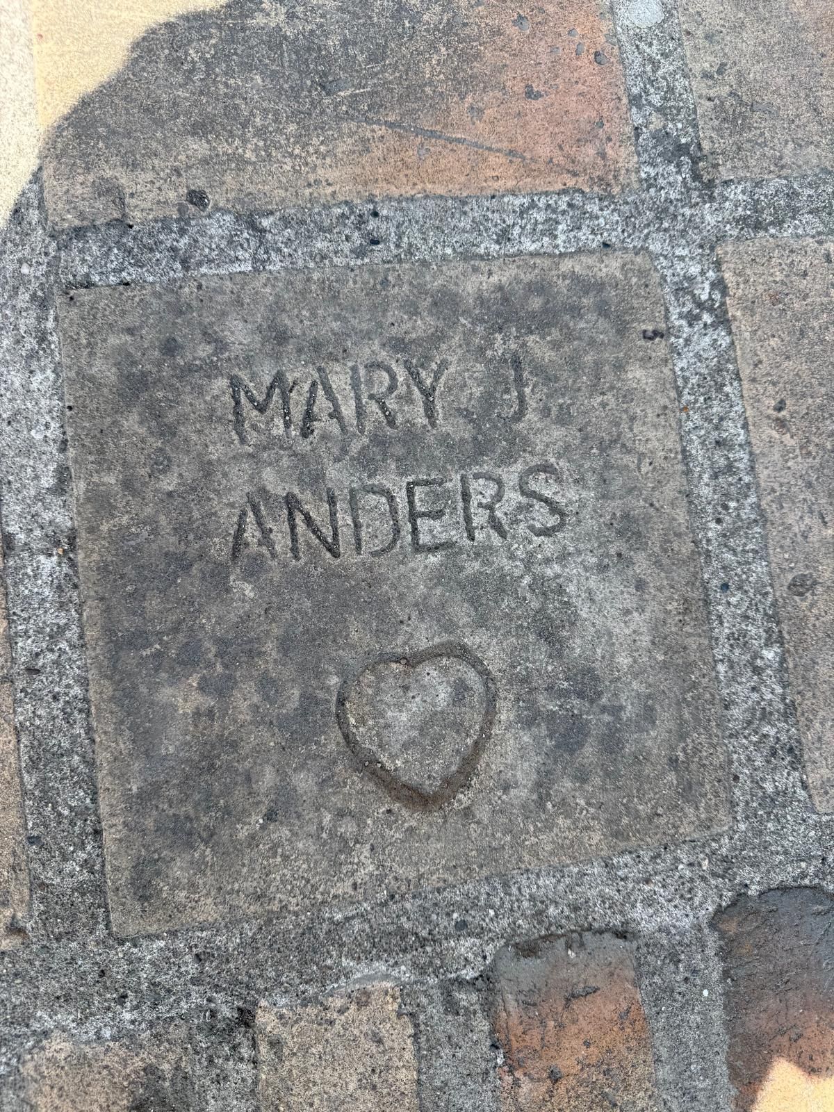 Close-up of a stone tile inscribed with 