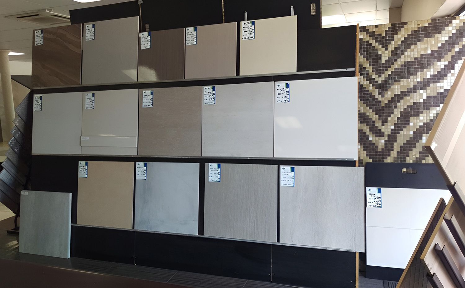 A Retail Display Rack Featuring An Assortment Of Square Tiles