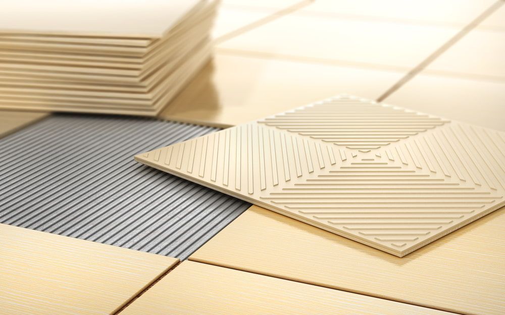 A Stack of Tiles Sitting on Top of a Tiled Floor — Northern Tile Gallery in Winnellie, NT