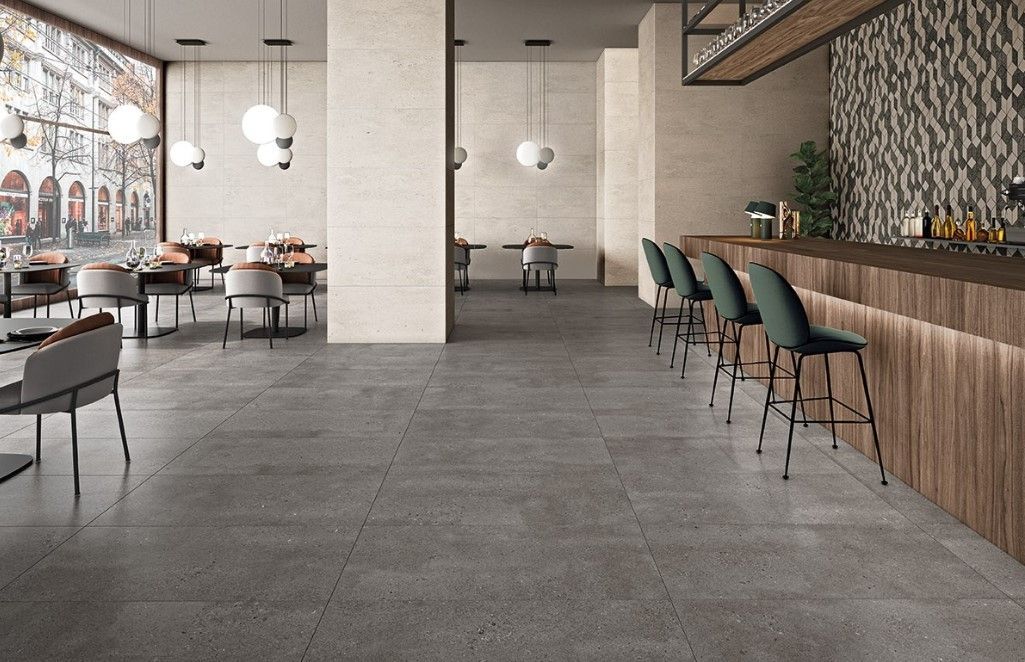 A Restaurant With Tables and Chairs and a Bar — Northern Tile Gallery in Winnellie, NT