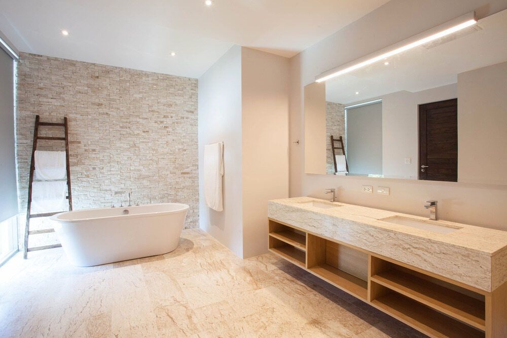 A Bathroom With Two Sinks and a Bathtub — Northern Tile Gallery in Winnellie, NT