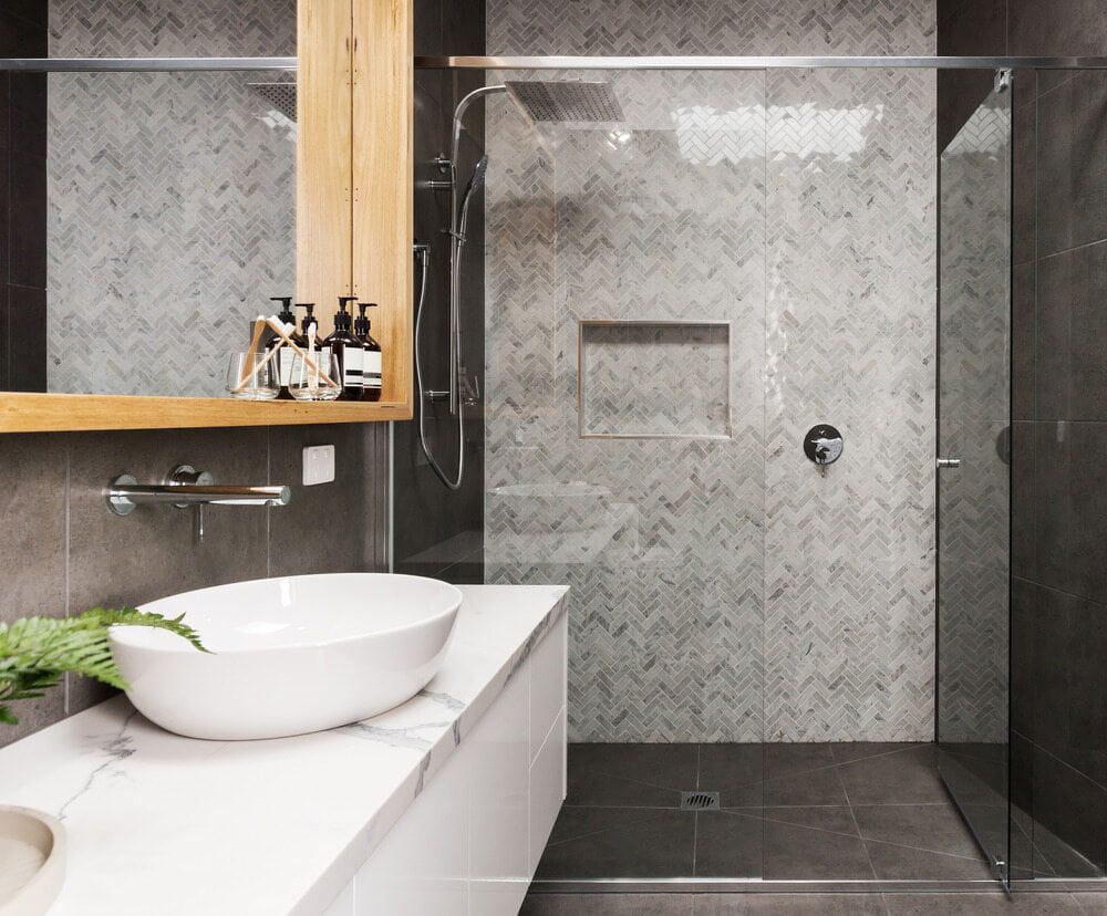 A Bathroom With a Sink and a Walk in Shower — Northern Tile Gallery in Winnellie, NT