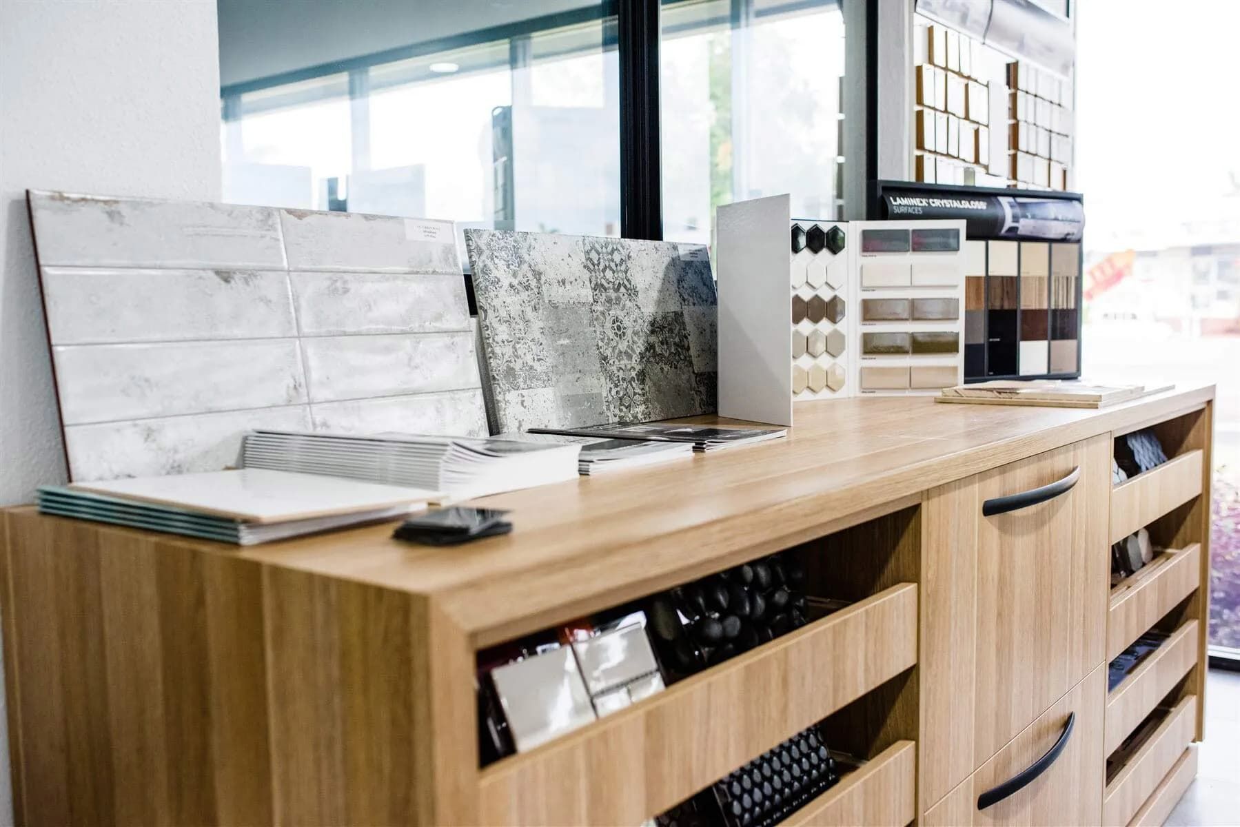 A Wooden Dresser With Drawers and Shelves in a Room — Northern Tile Gallery in Winnellie, NT