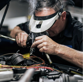 A man working on a car | Adler Rennsport