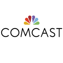 A comcast logo with a rainbow colored flower on a white background.