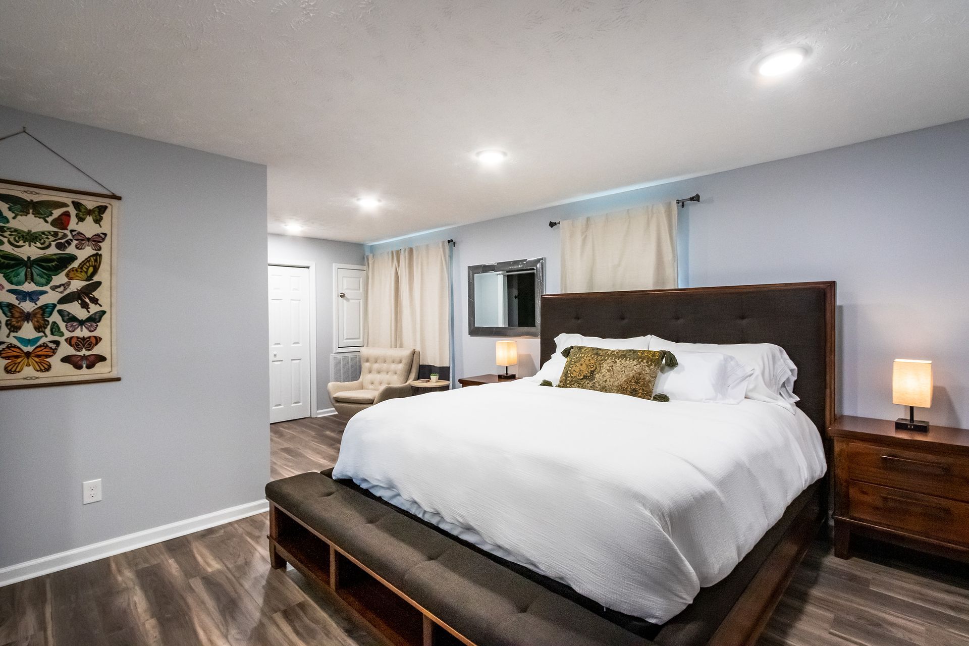 There is a large bed in the middle of the room.