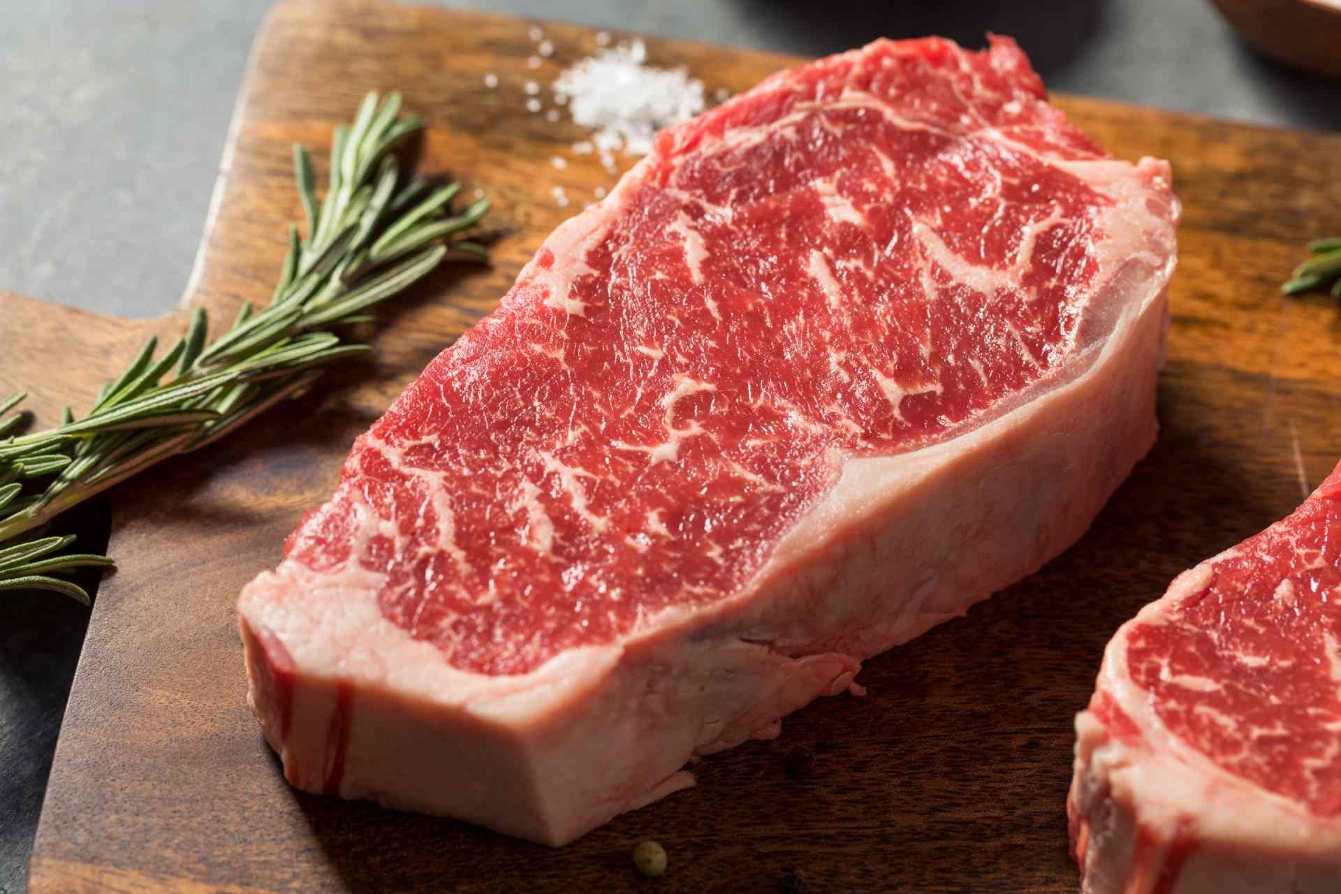 Red Angus steak on a cutting board near Carlisle, KY