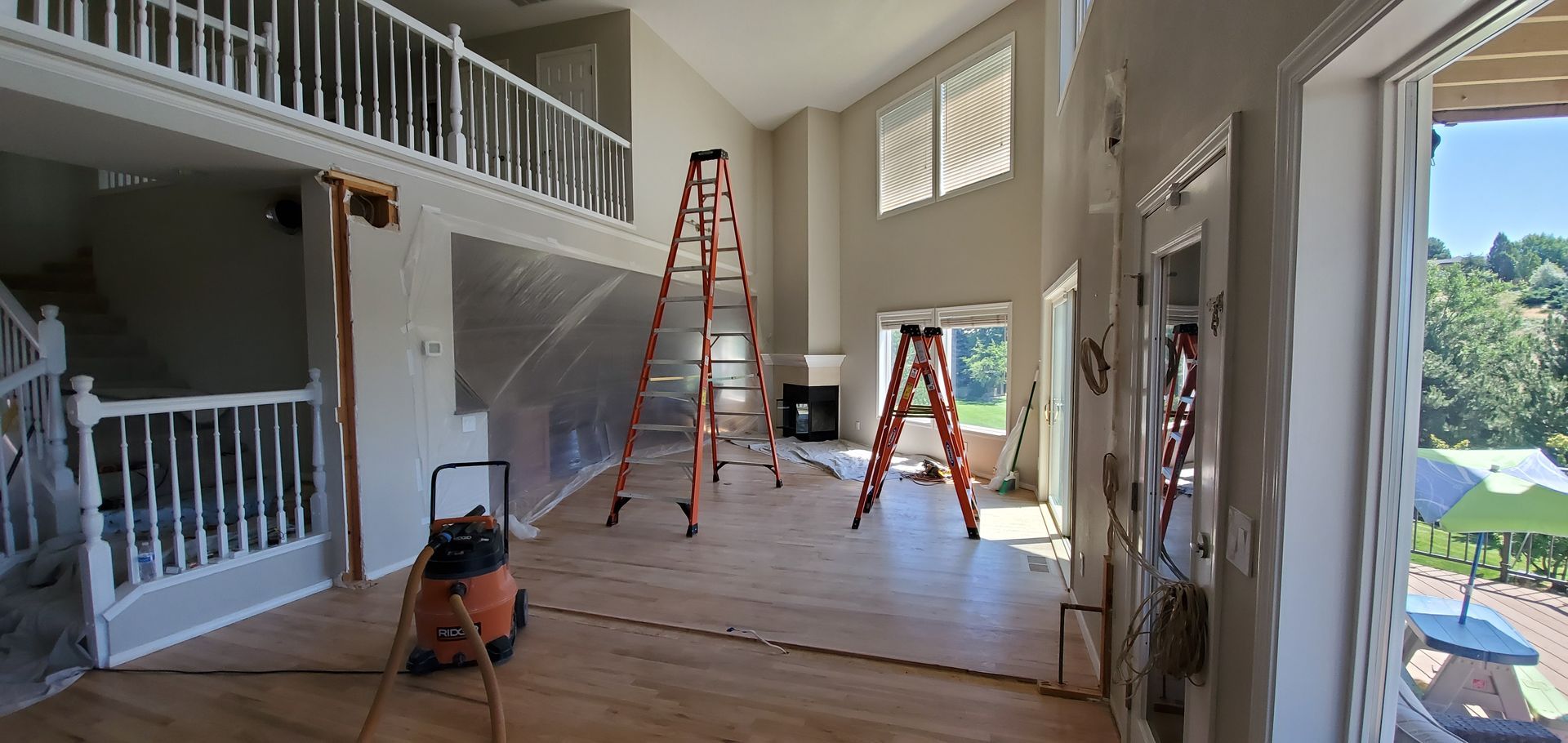 There are two ladders in the middle of the room.