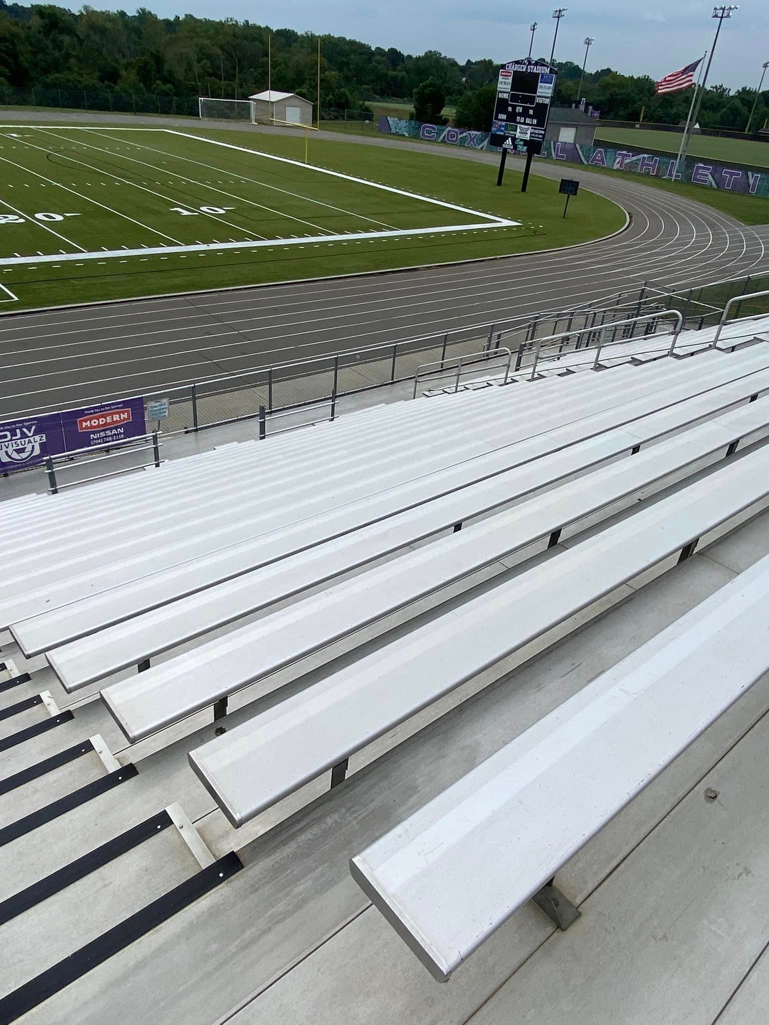 Cleaned stadium bleachers and seating area maintained using high-pressure power washing services