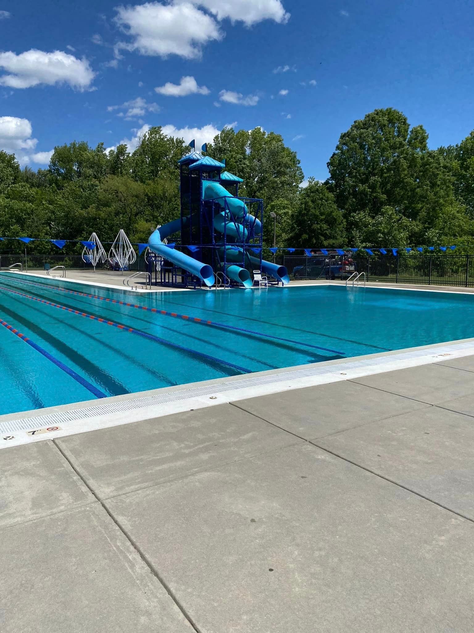 Clean pool deck surface showing results of concrete cleaning and power washing services