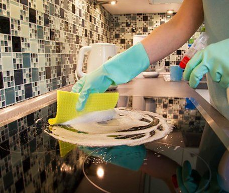 General Cleaning Services — Hands With Protective Gloves in Seattle, WA