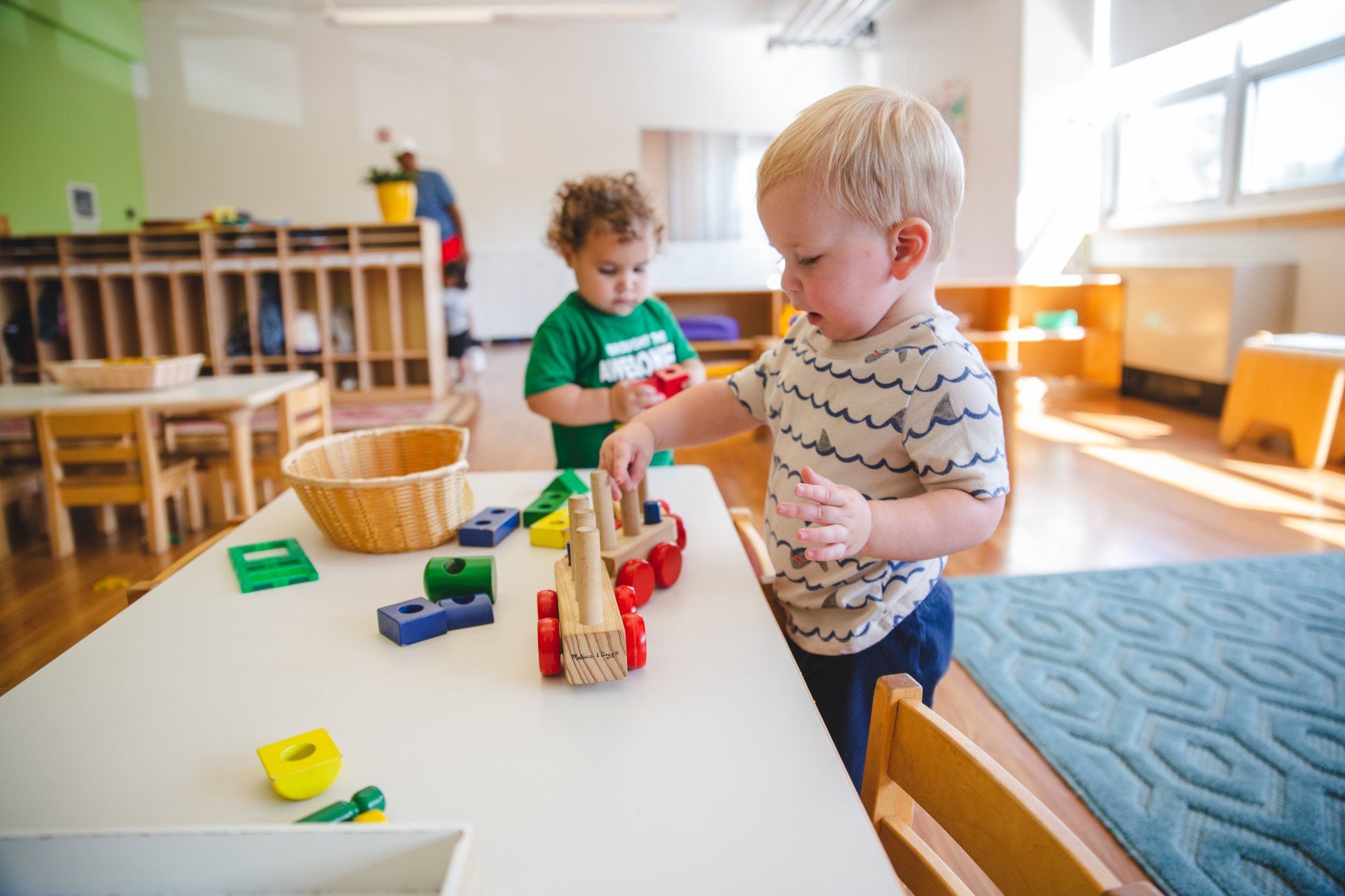 Montessori toddlers working in the classroom