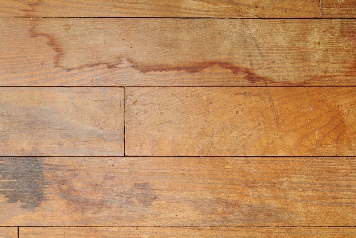 Wood floors that need restoration because they are badly stained