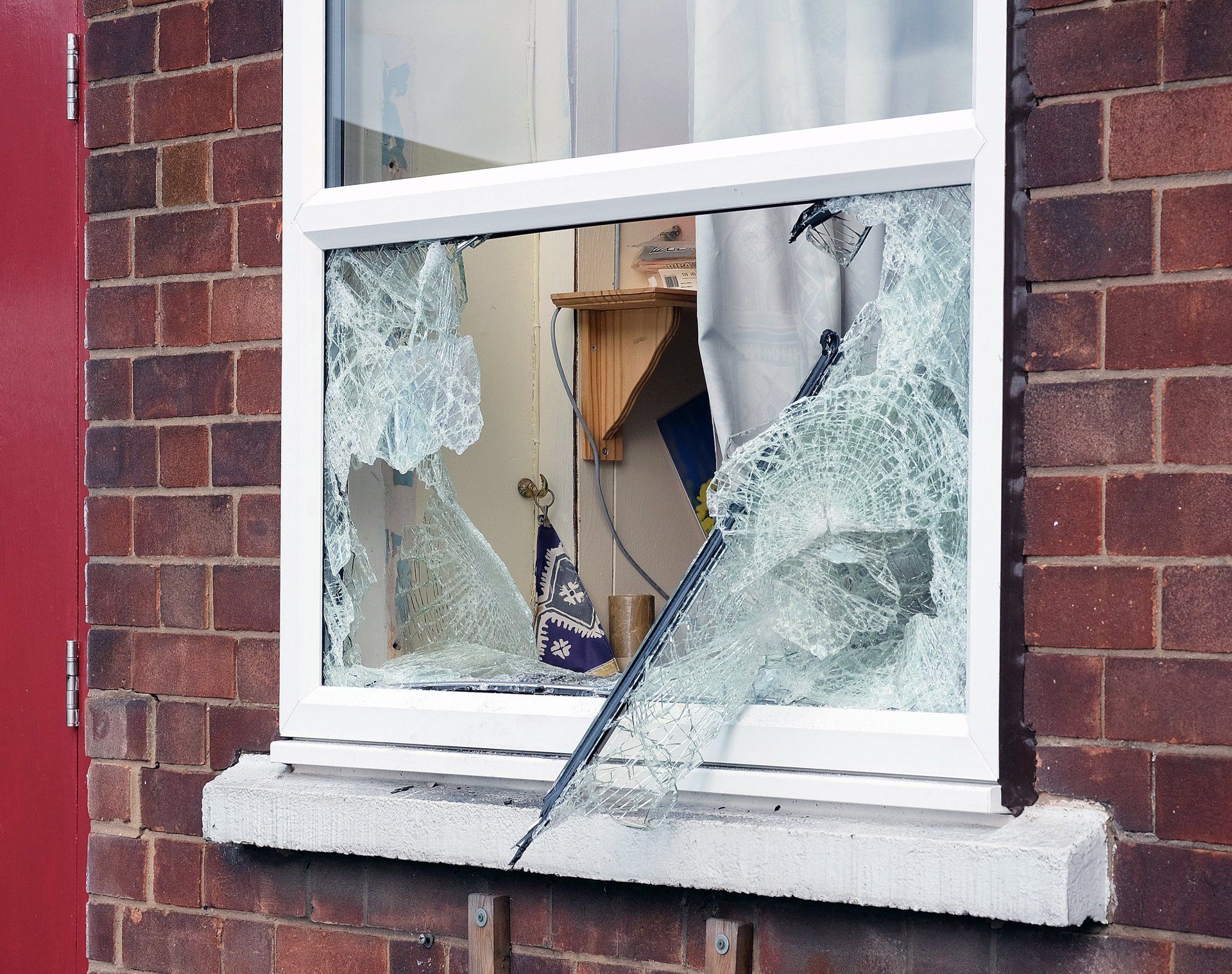 Image of a window that has been broken