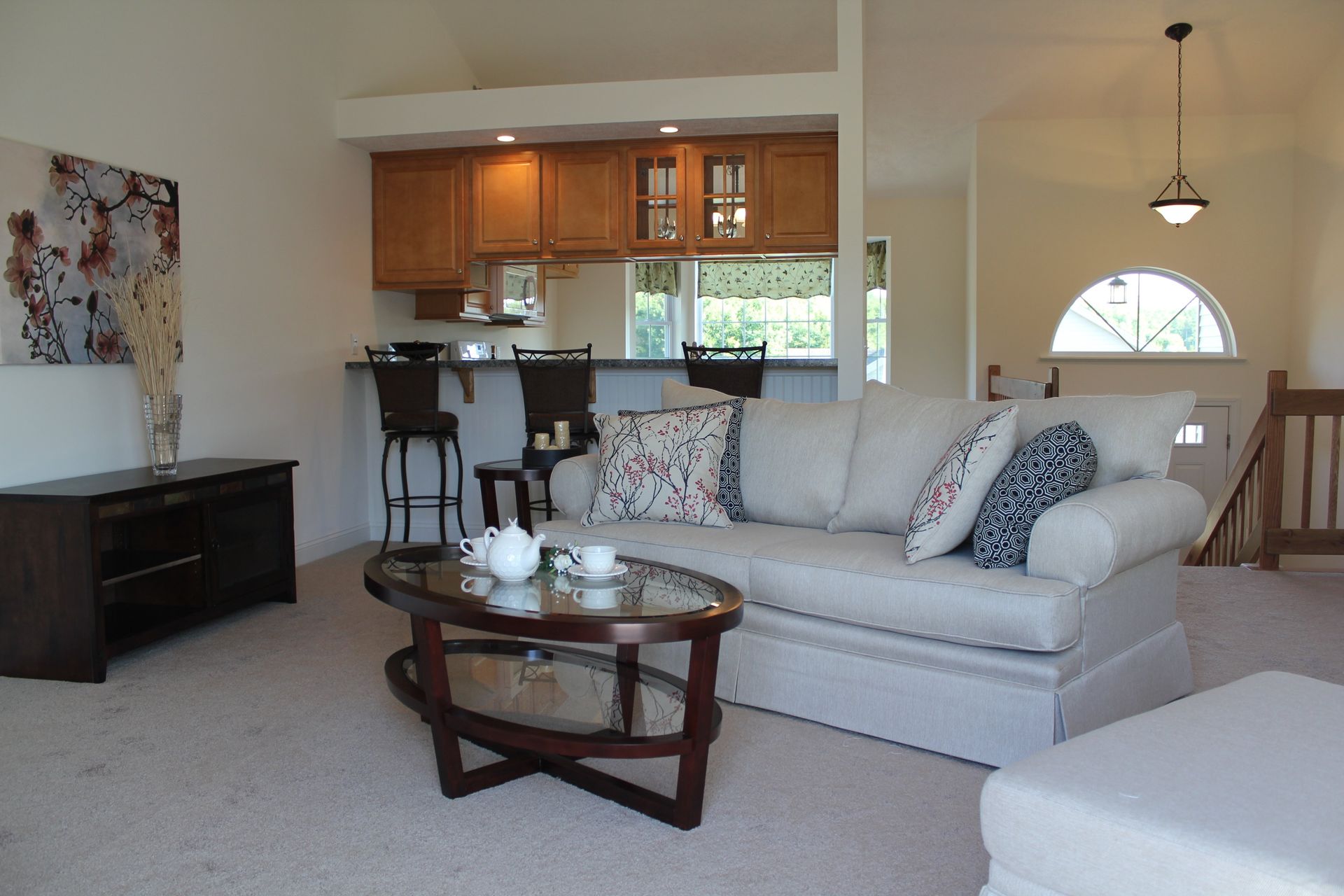 A living room with a couch and a coffee table
