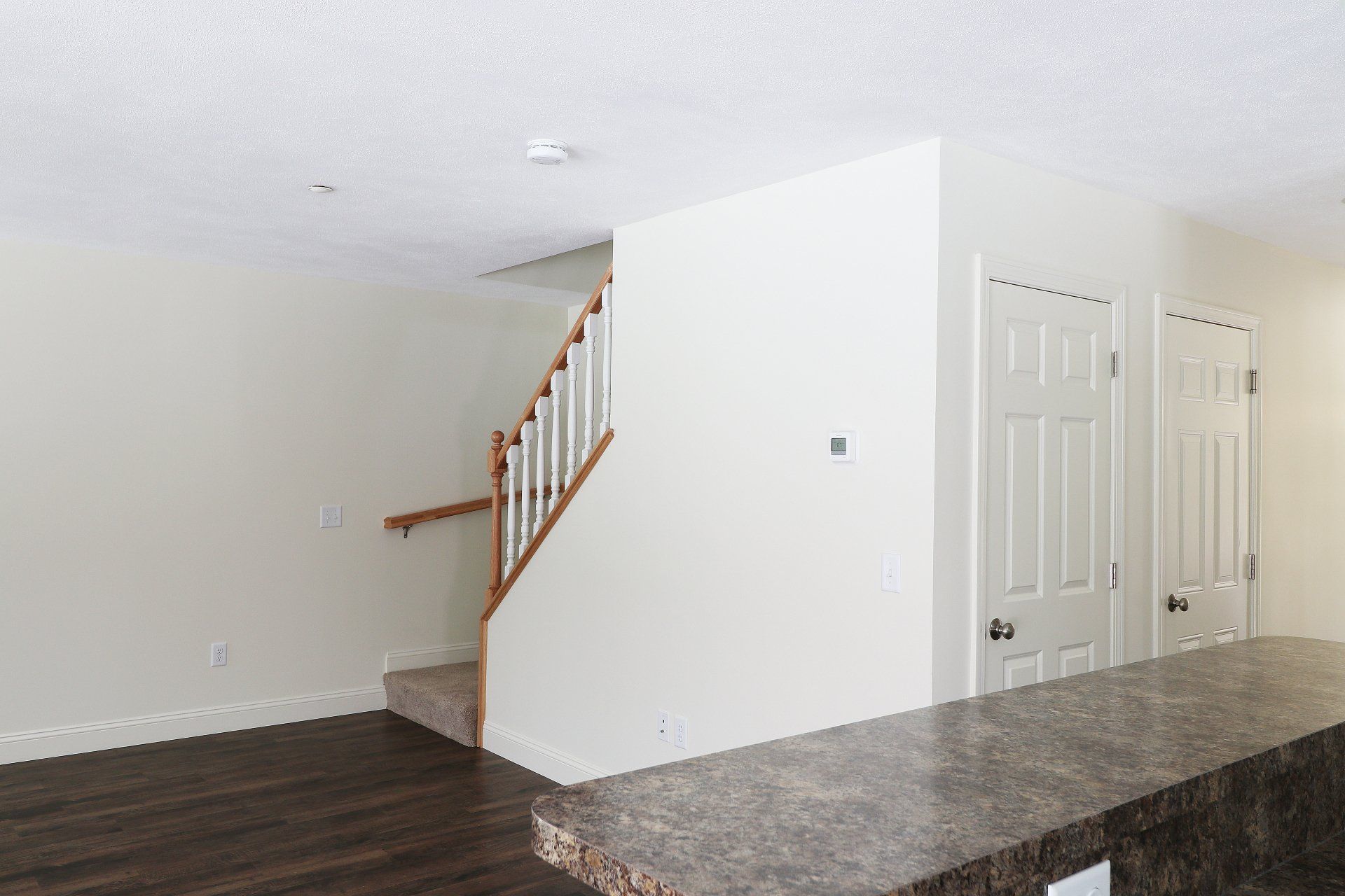 There is a staircase in the middle of the room.