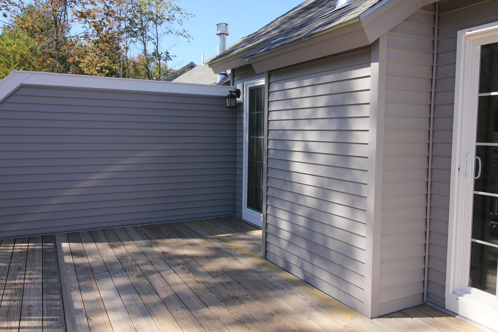 A house with a patio and a sliding glass door