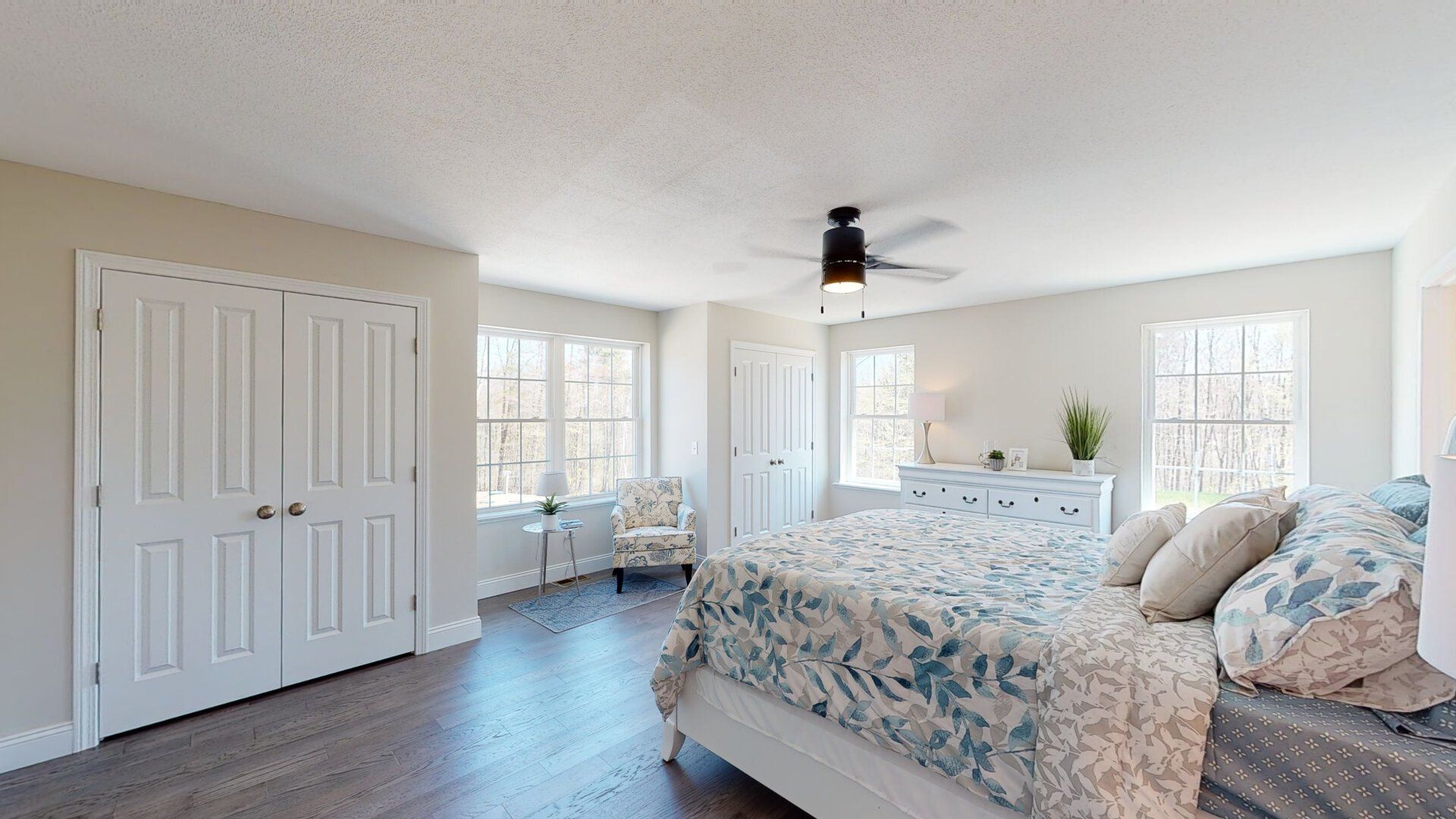 There is a large bed in the middle of the room.