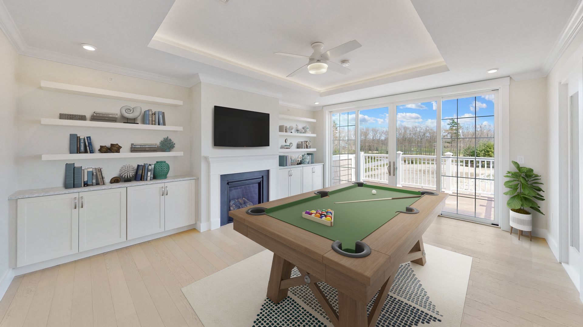 There is a pool table in the middle of the room.