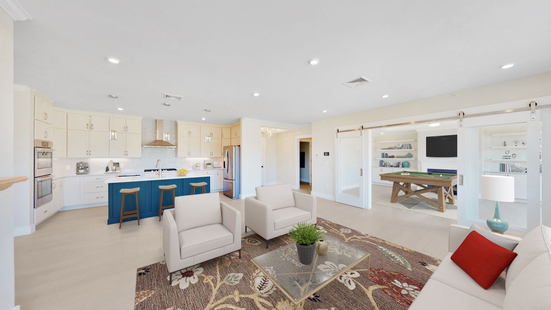 A living room with a couch , chairs , and a table.