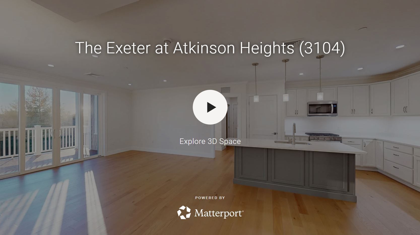 A 3d rendering of a kitchen with a large island and a refrigerator.