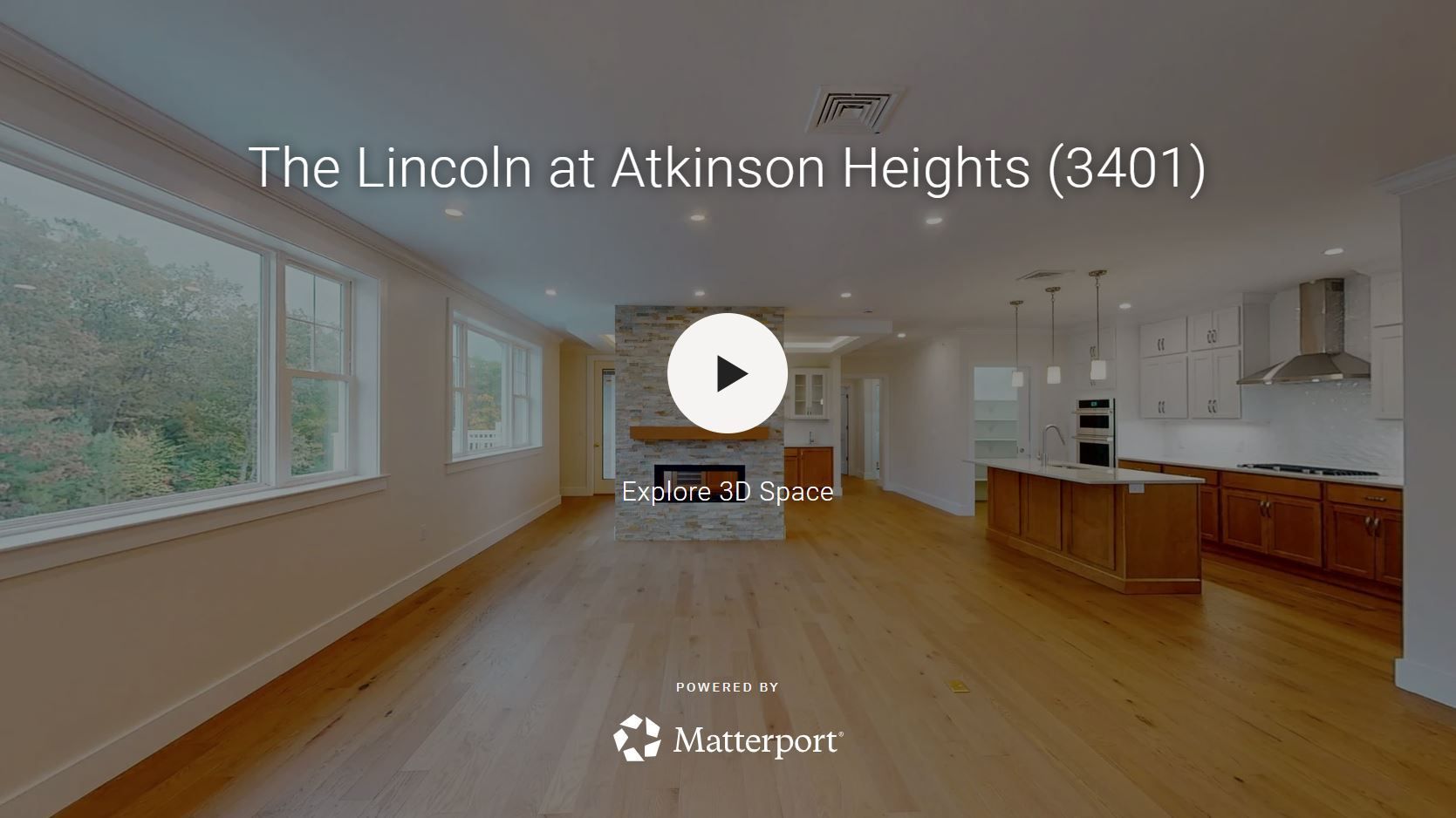 A living room with a couch , chairs , and a fireplace.