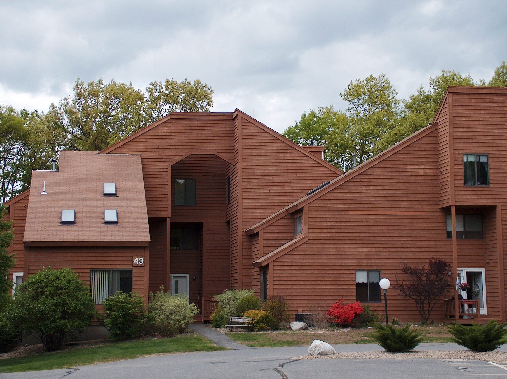 A large brown building with the number 10 on it