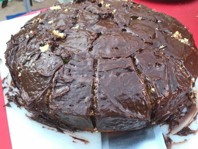 A chocolate cake that has been cut into slices