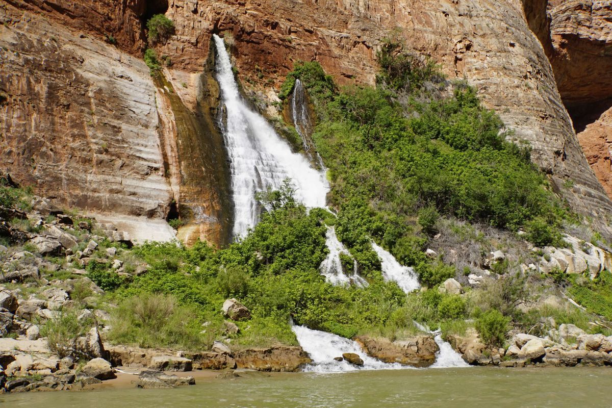 A waterfall in the middle of a river