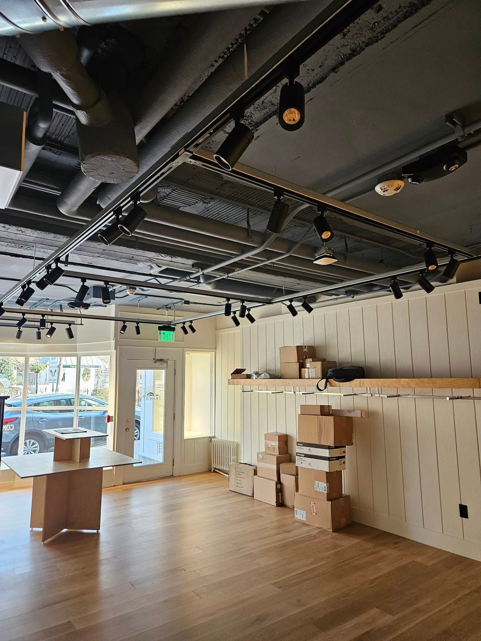 Interior of a store with beige wall paint.