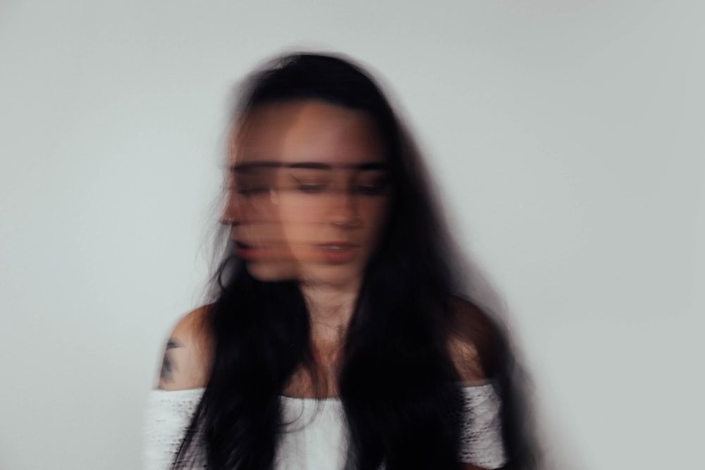 A woman with a blurry face