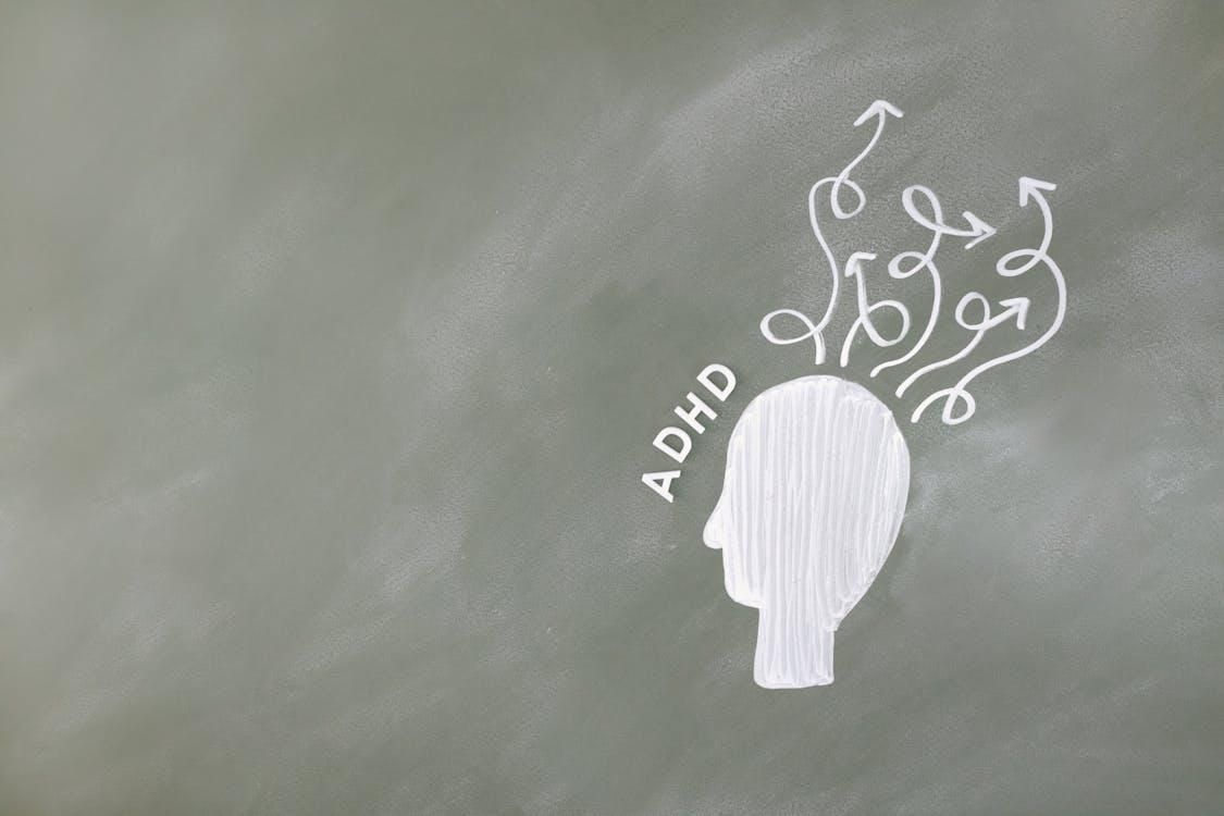 An illustration showing a head and brain, depicting ADHD