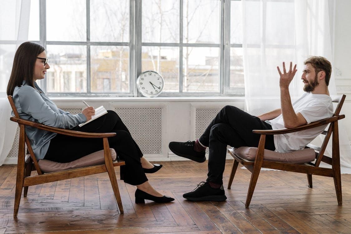Two people talking
