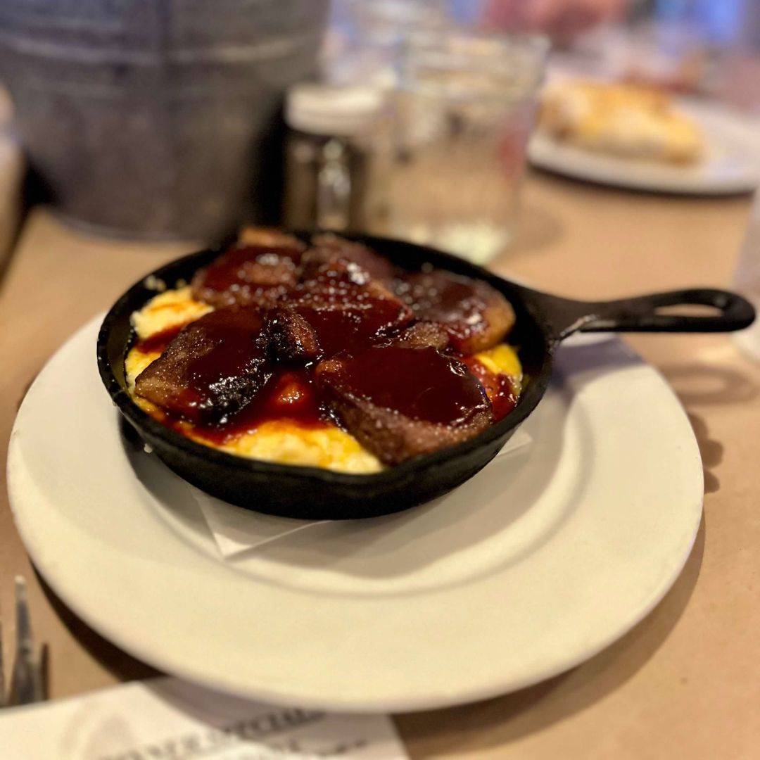 cast iron pan with burnt ends BBQ