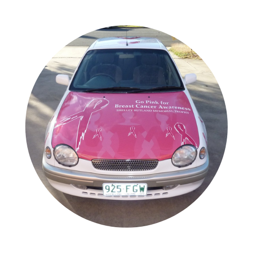 Car with Breast Cancer Signage | Logo Design in Mackay