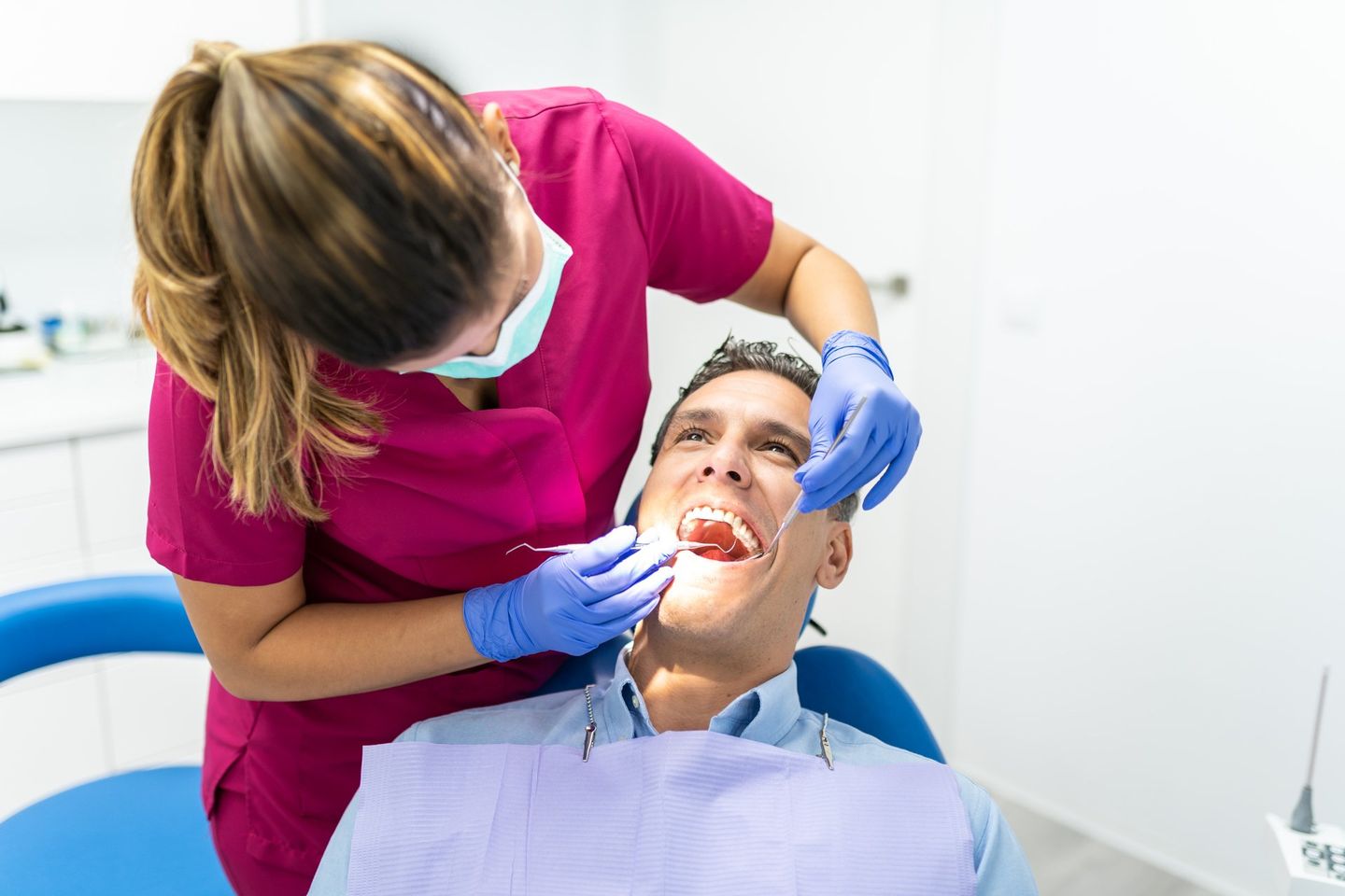 Man Getting A Checkup At The Dentist Clinic - Dental Treatments in Port Macquarie, NSW
