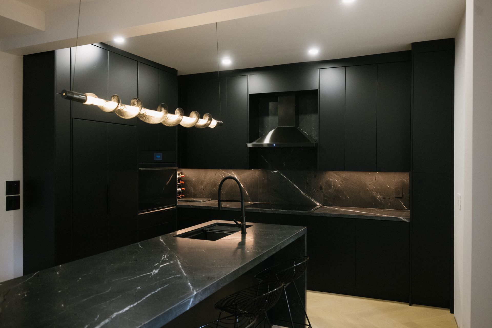 modern black, wood, and white island