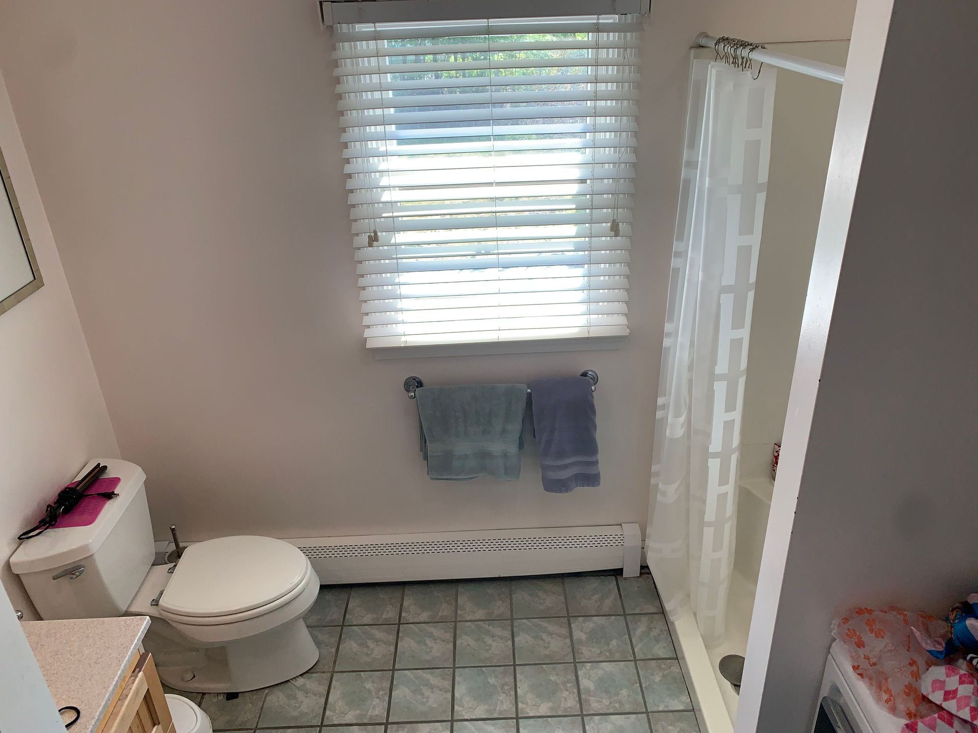 Outdated bathroom before picture by A-Z Finish Carpentry