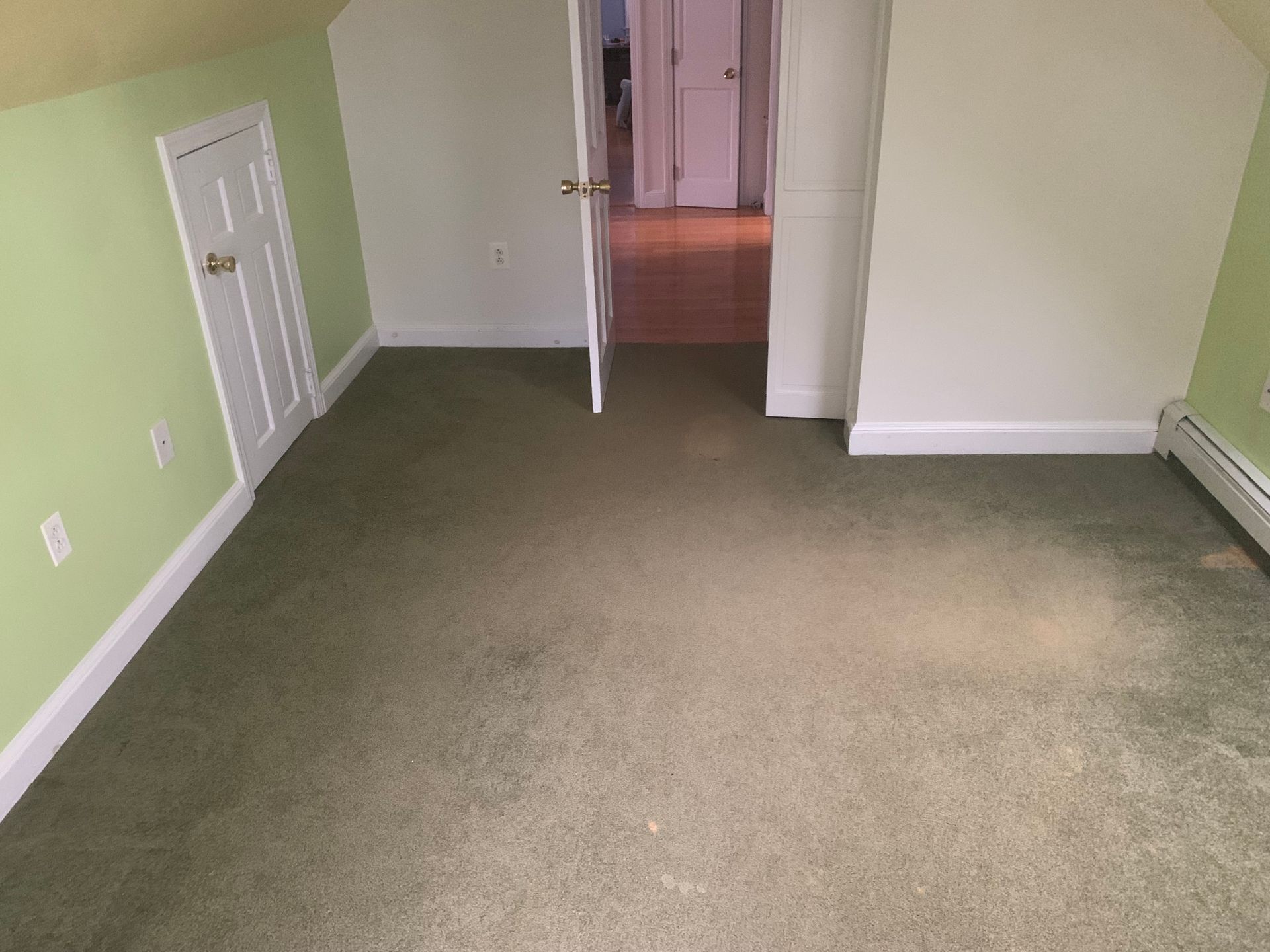 Dated Melrose bedroom before nursery renovation with old carpet