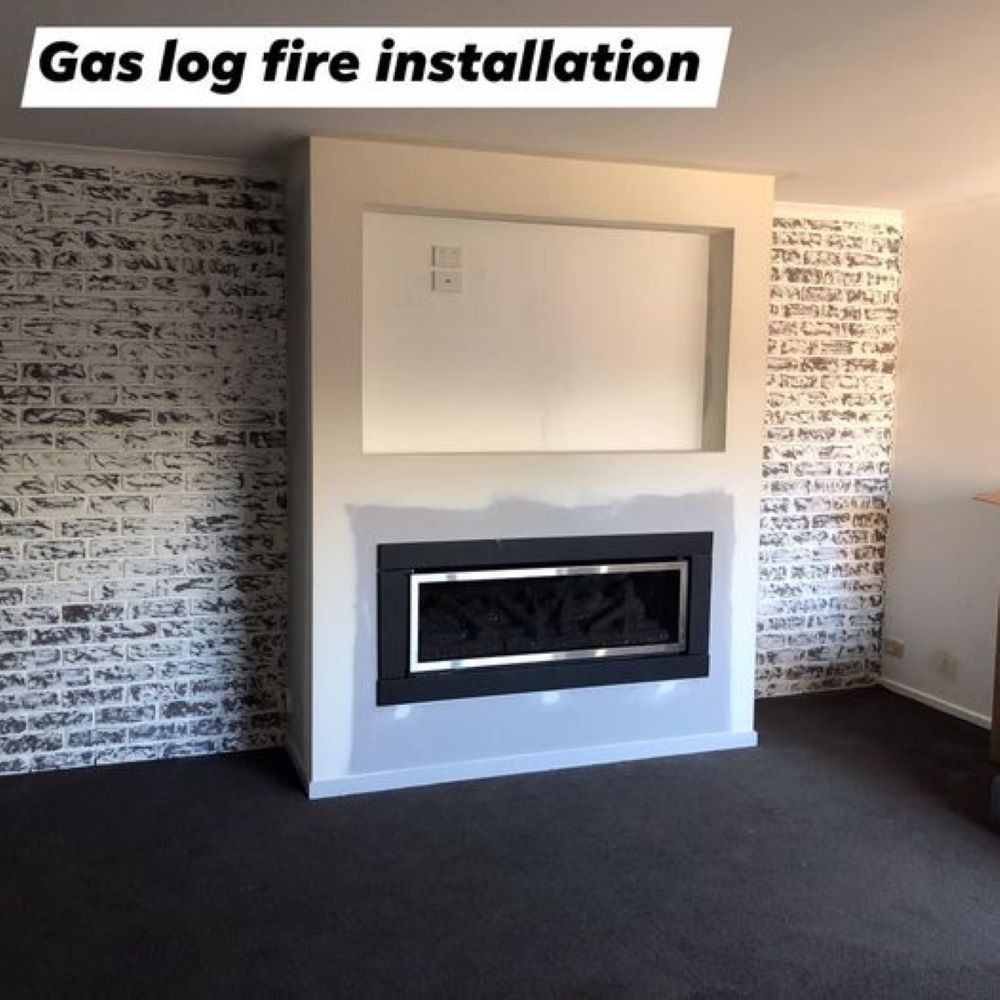 A Room With a Fireplace and a Sign That Says Gas Log Fire Installation — Fig Facility Services in Lara, VIC