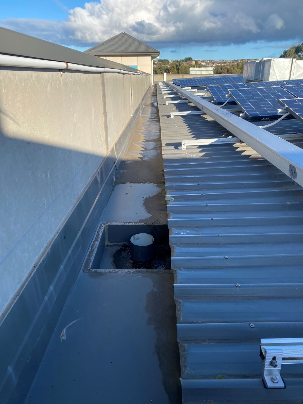 A Roof With a Lot of Solar Panels on It — Fig Facility Services in Lara, VIC